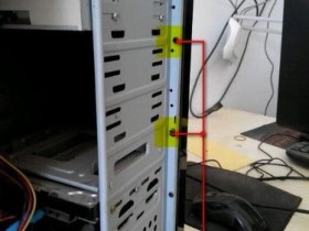 电脑主机箱前机板怎么拆?